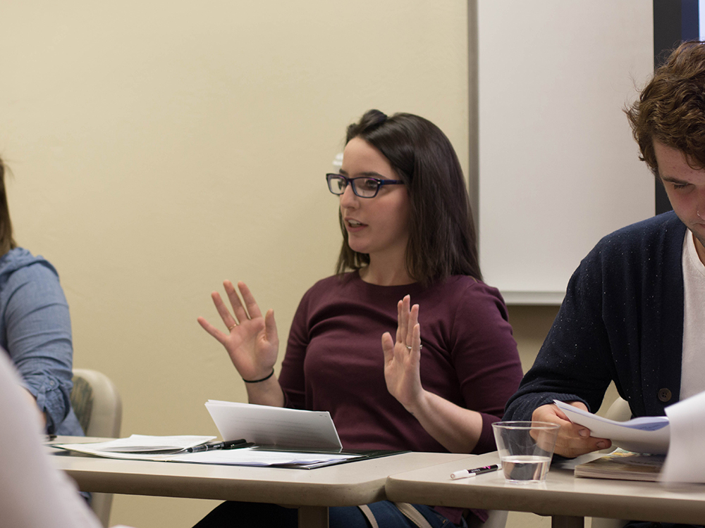 Pictured is a Point Park undergraduate student at the Undergraduate Research Symposium.